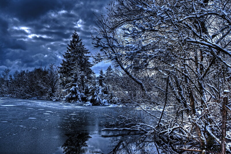 Snowy winter river landscape