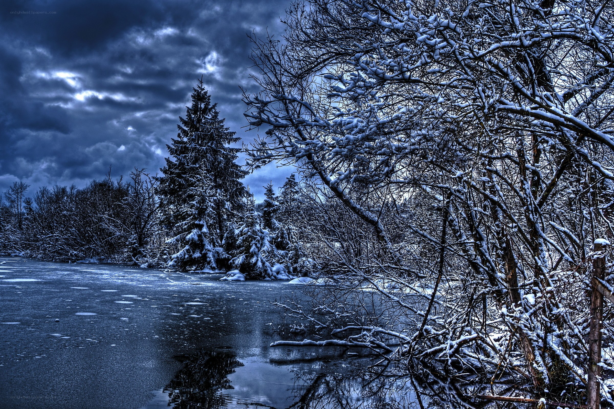 Snowy winter river landscape