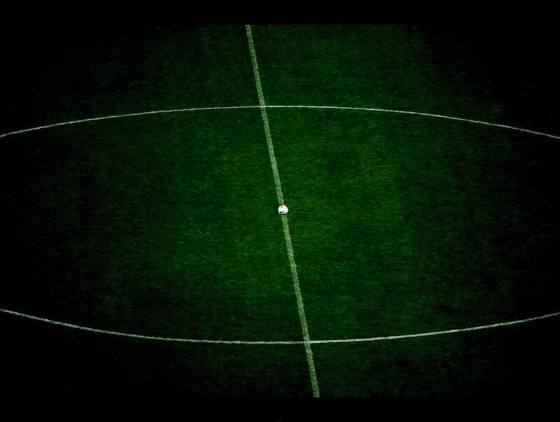 Soccer ball at center circle