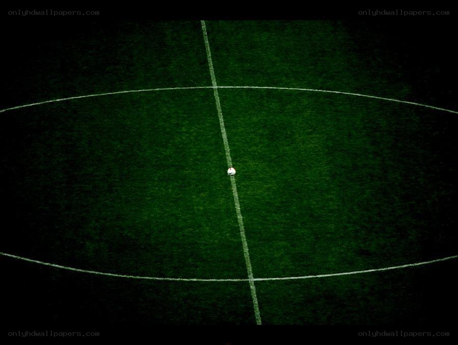 Soccer ball at center circle