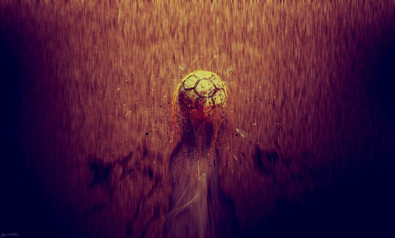 soccer ball breaking through surface