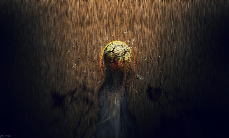 Soccer ball breaking through wall