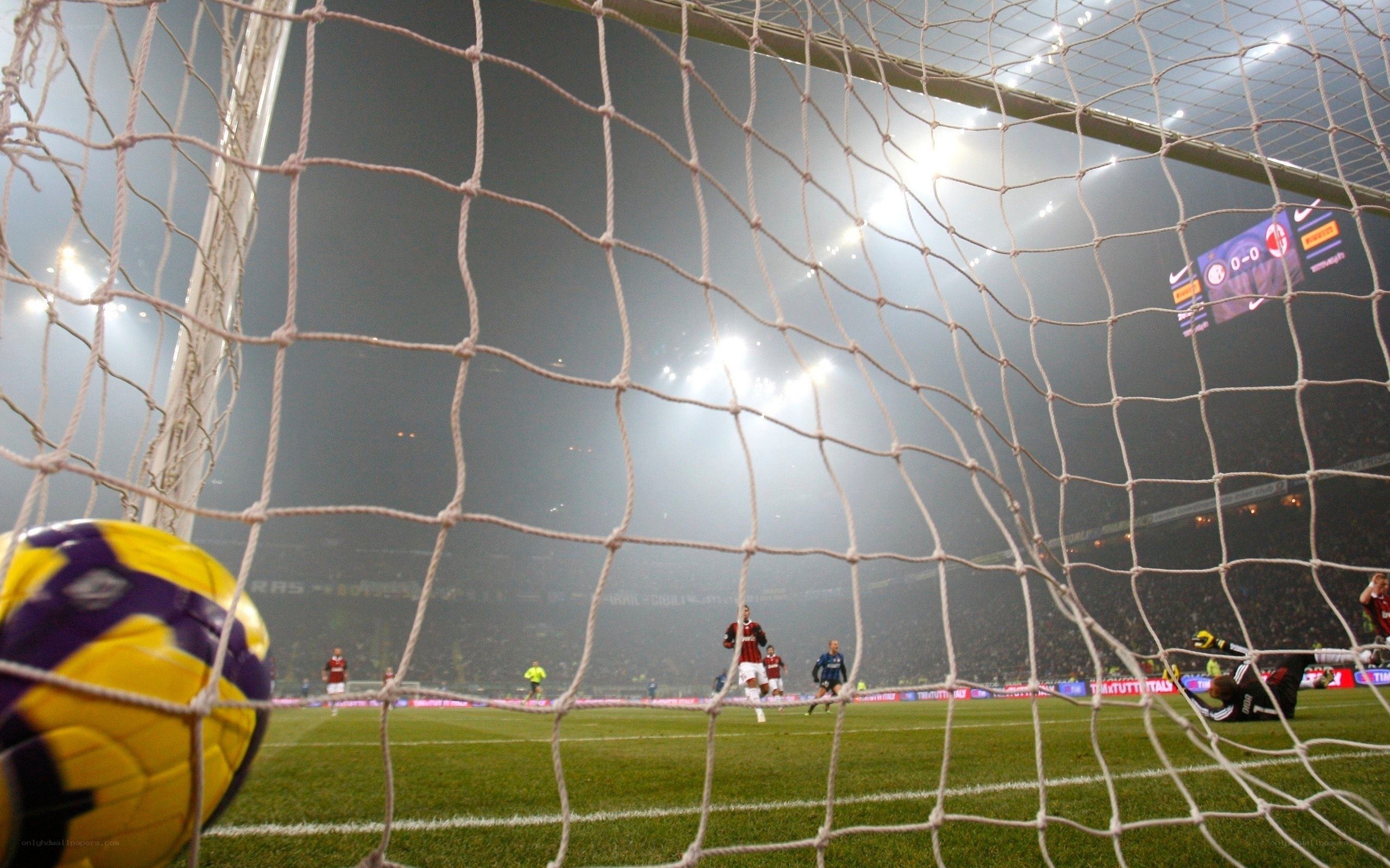 Soccer ball in goal net