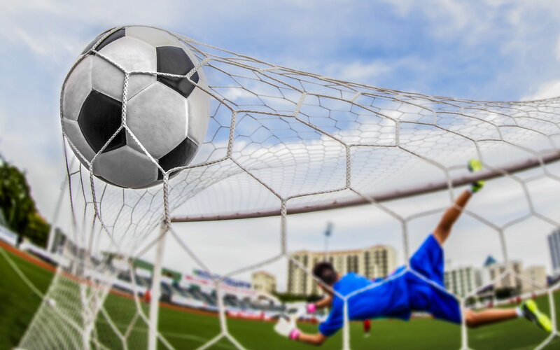 Soccer Ball in Goal Net — White, Dynamic