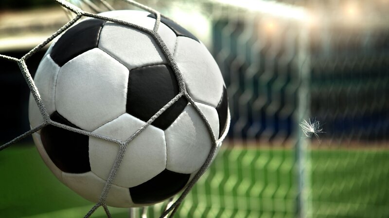 Soccer Ball in Net — White, Dramatic