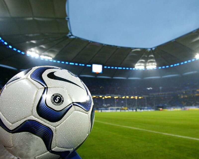 Soccer Ball in Stadium — Green, Dramatic