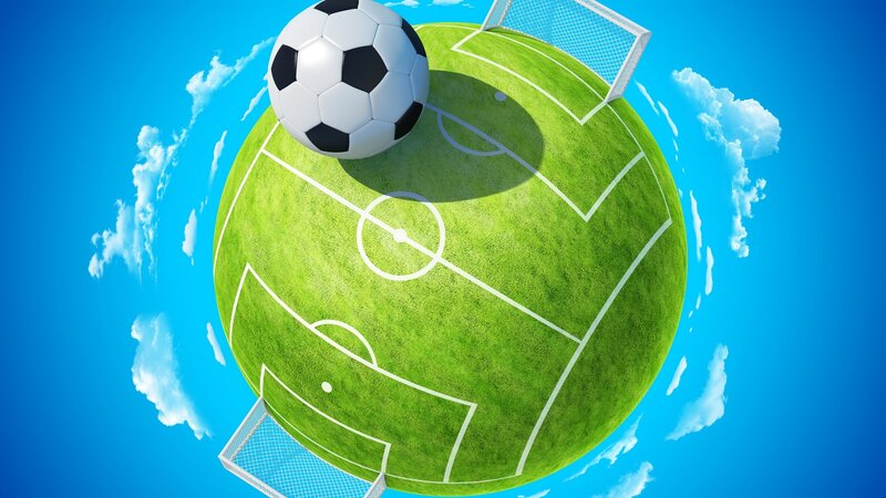 soccer ball on field globe