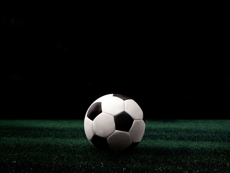 soccer ball on grass field