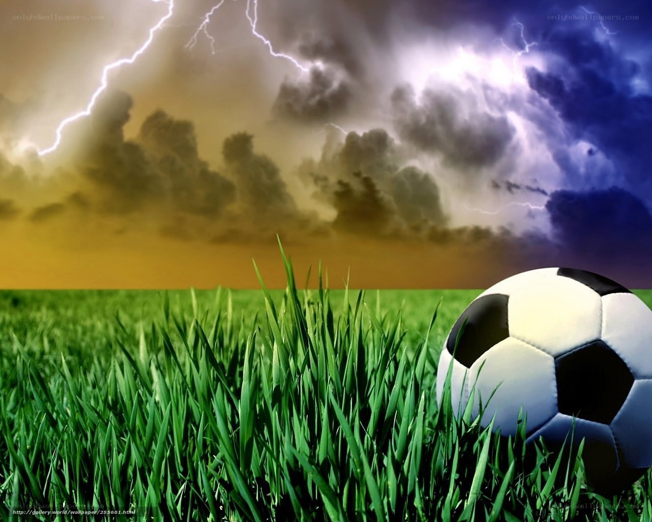 Soccer ball on stormy field