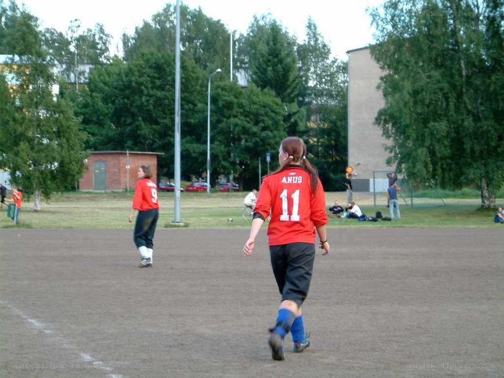 Soccer game on a dirt field