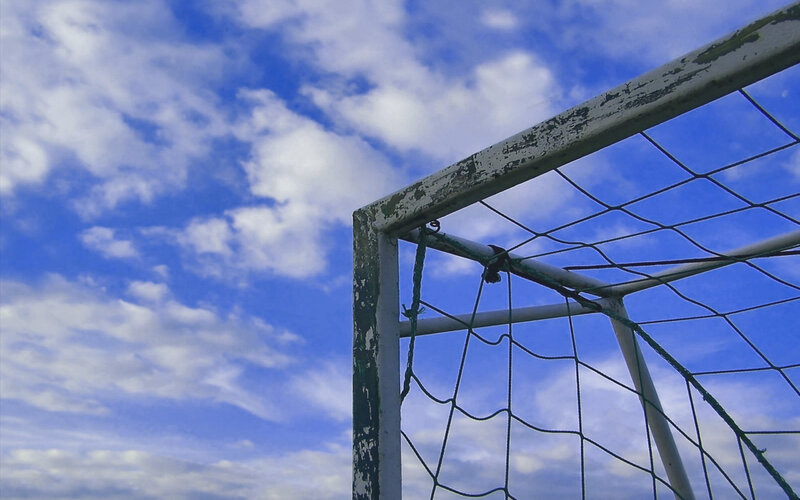 soccer goal against blue sky