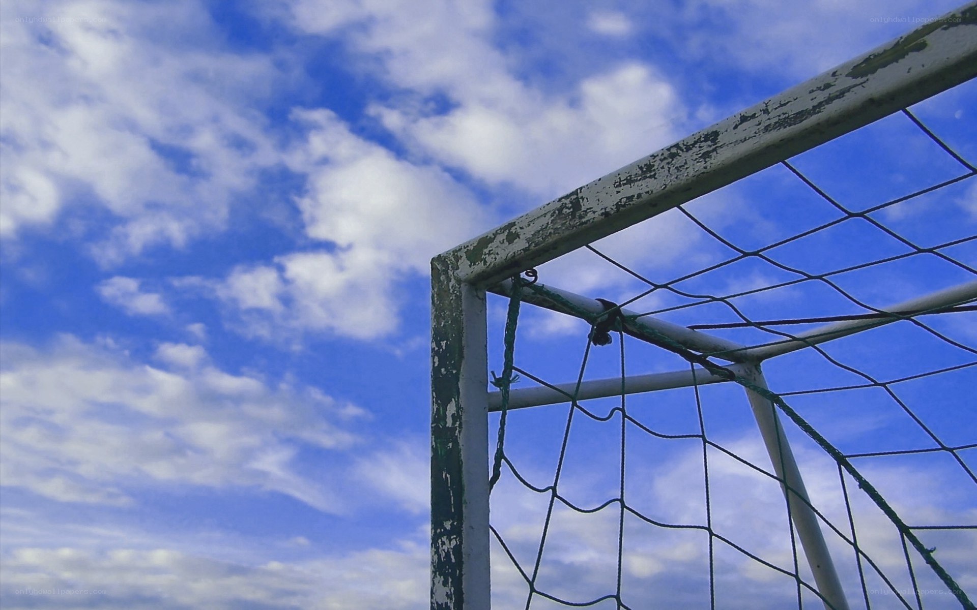soccer goal against blue sky