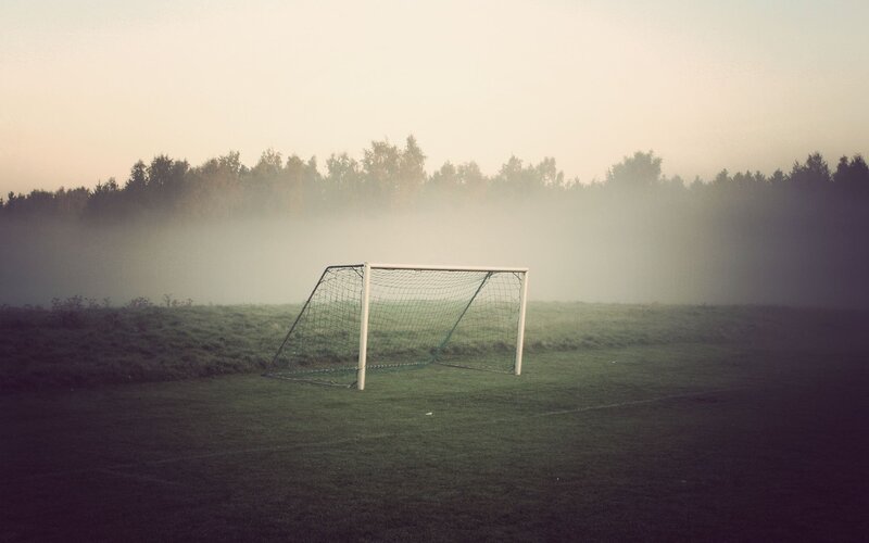 Soccer goal in morning fog