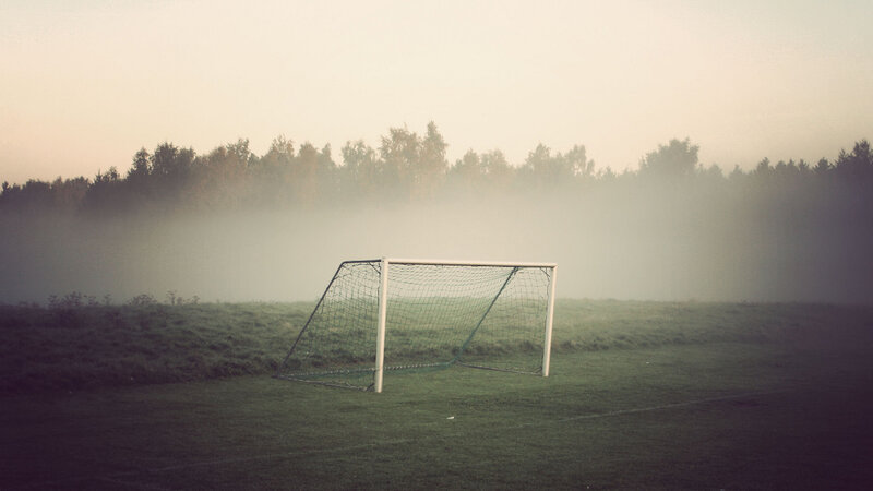 Soccer goal in morning fog