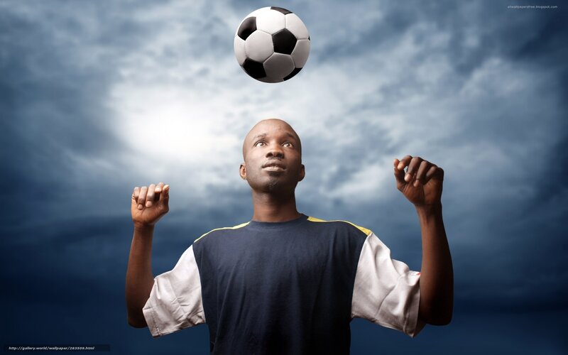 Soccer player balancing ball