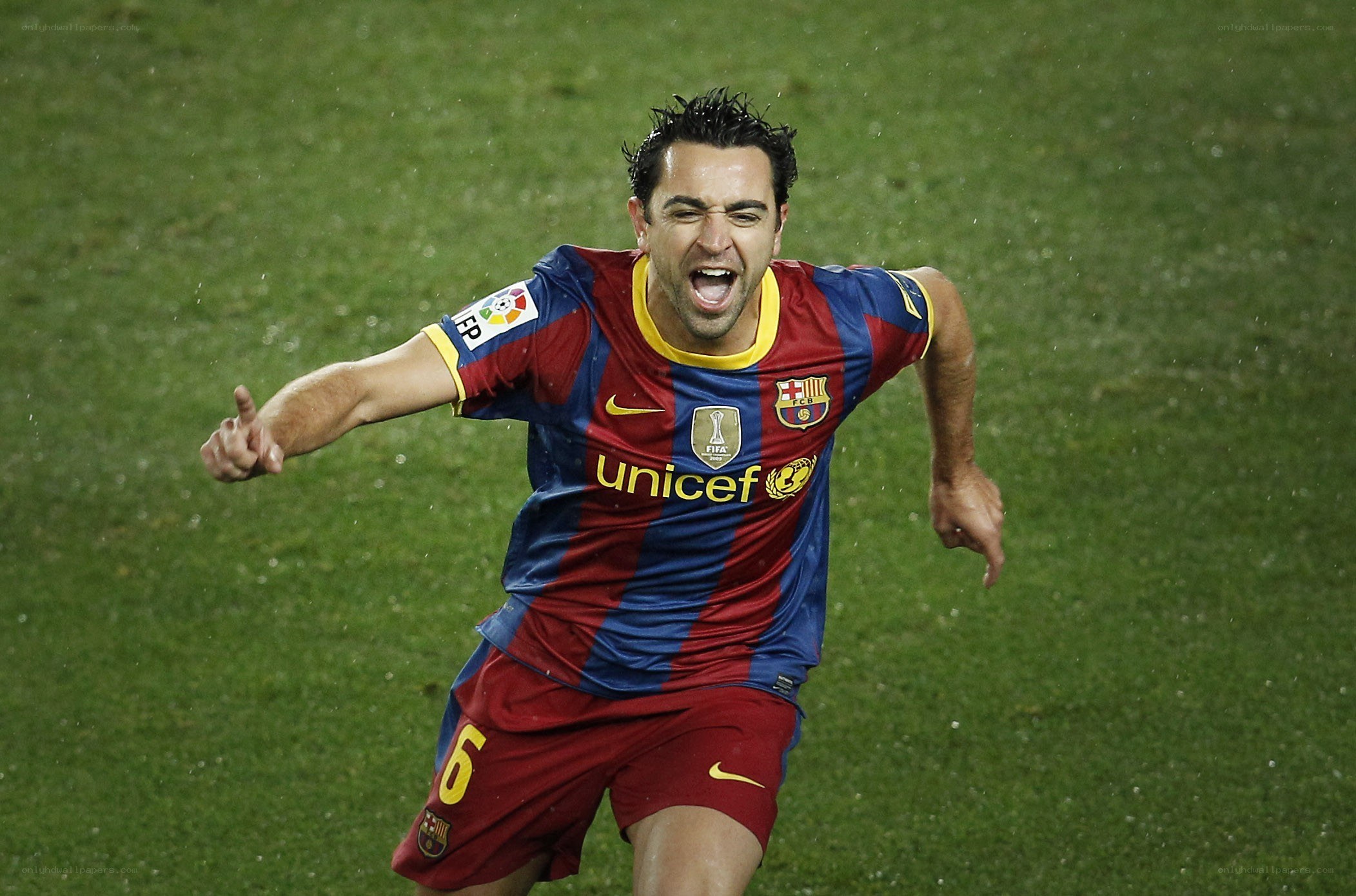 Soccer player celebrating on field