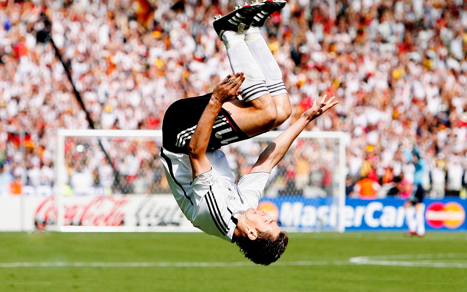 soccer player doing backflip