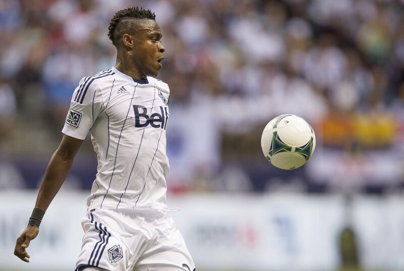 Soccer Player in Action — White, Focused