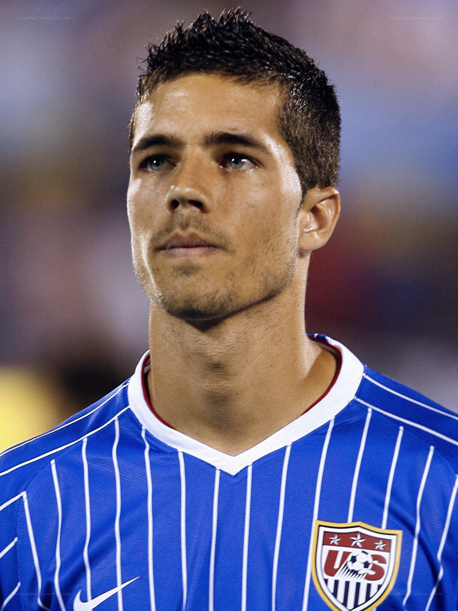 soccer player in blue jersey