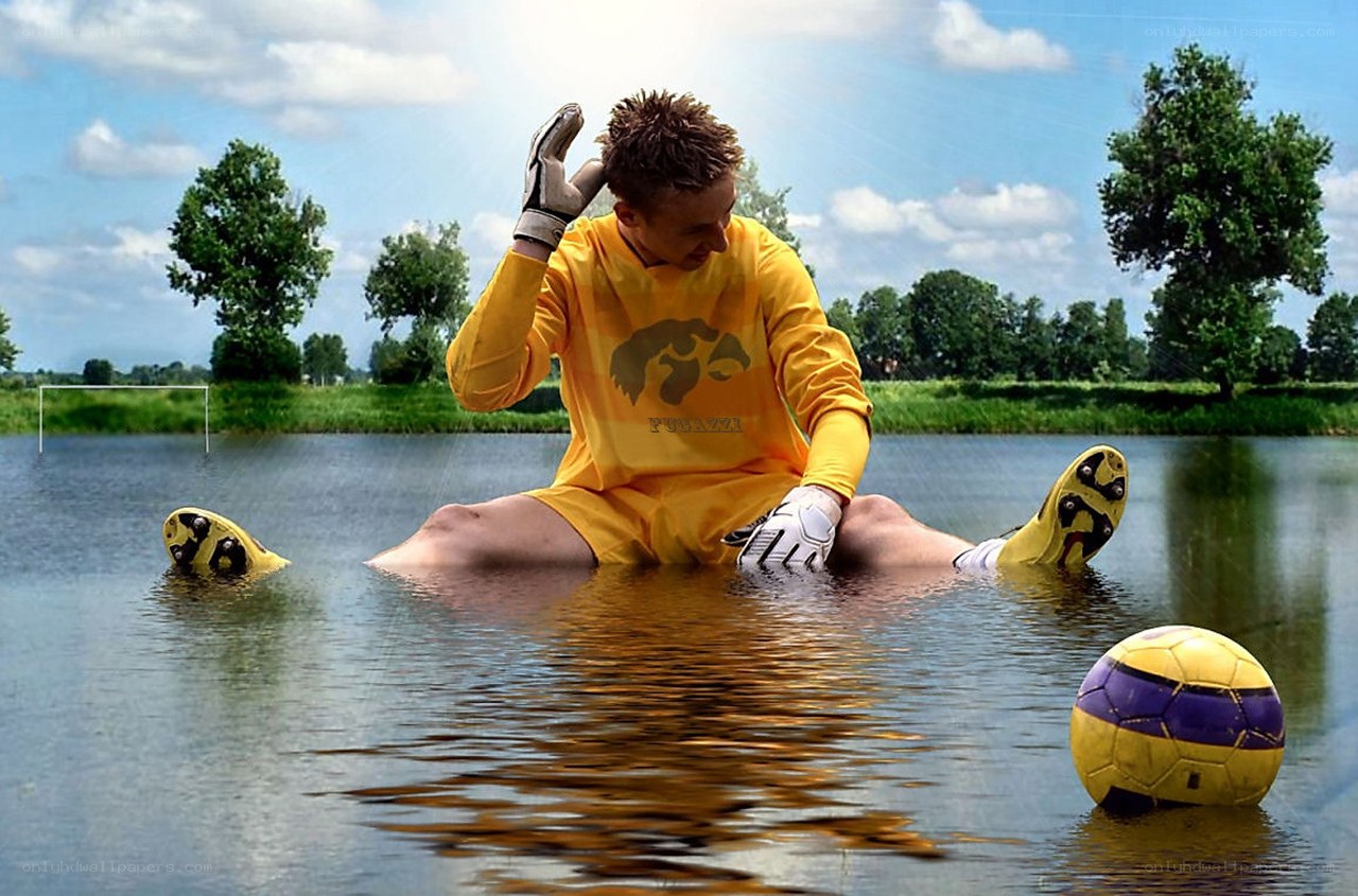 Soccer player in flooded field