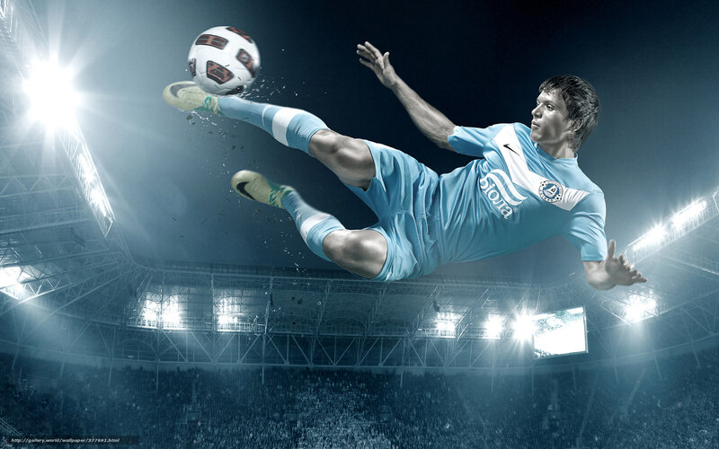 Soccer player in mid-air kick
