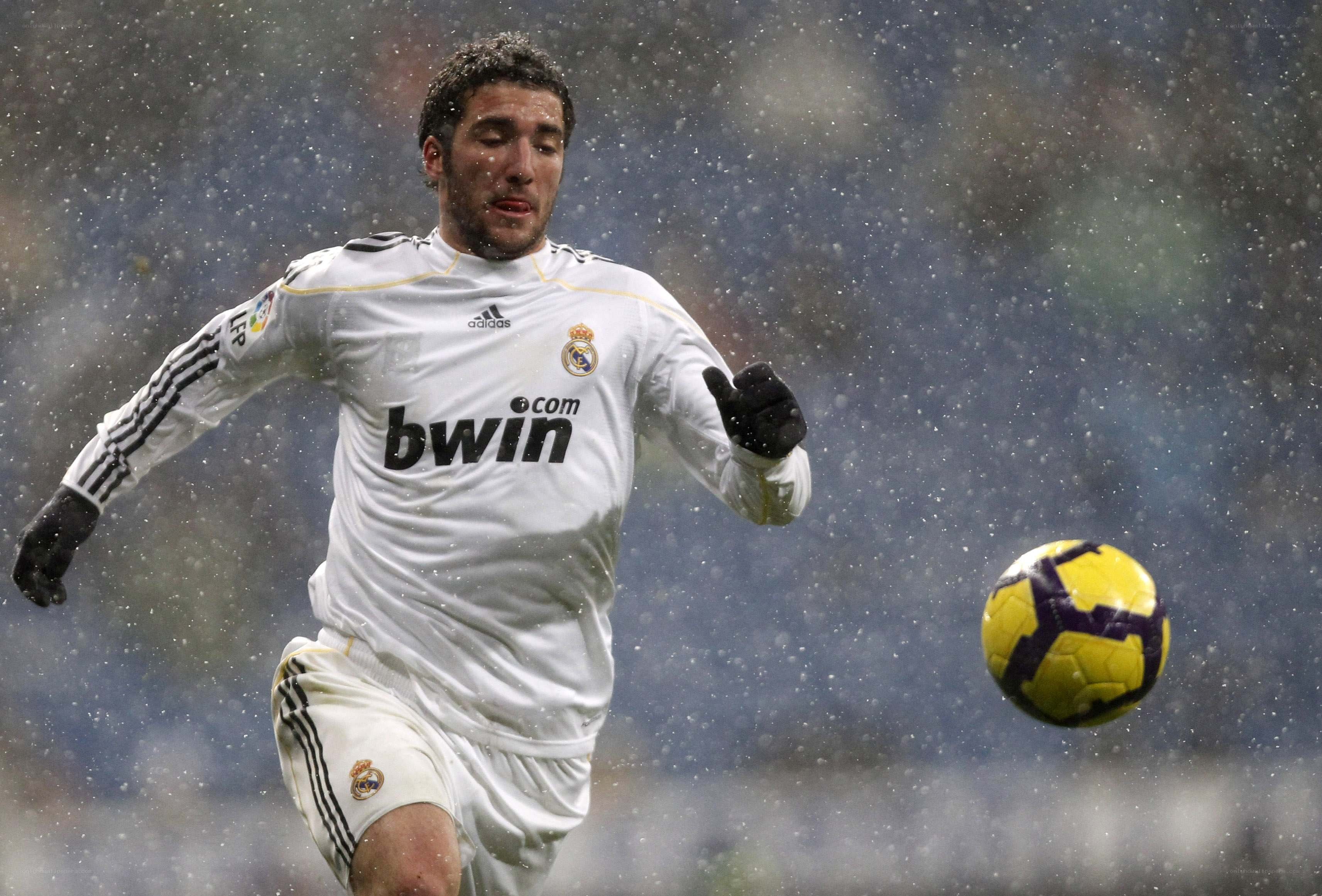 soccer player in rain
