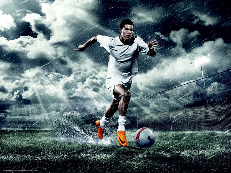 Soccer player in rain