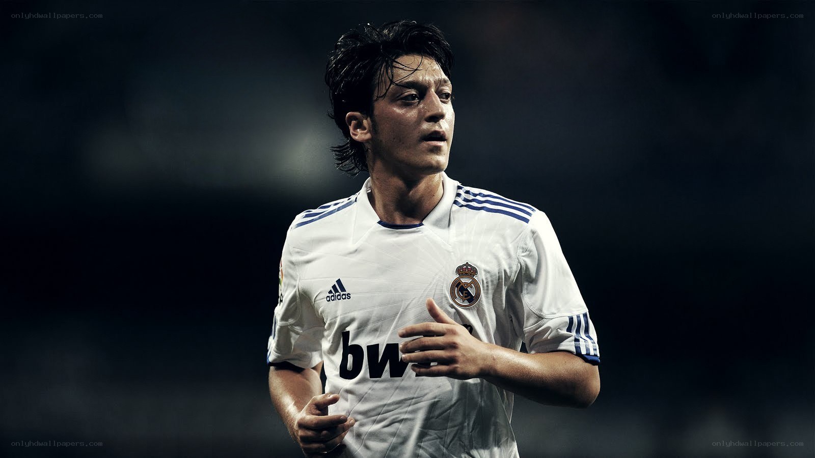 soccer player in white jersey