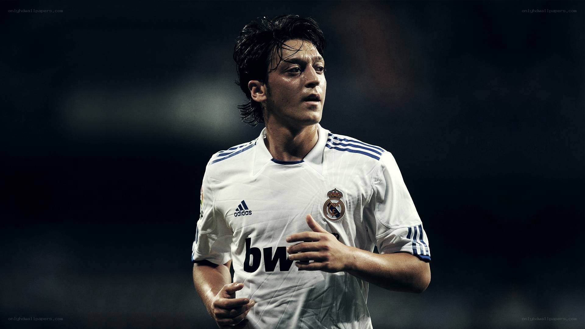 soccer player in white jersey