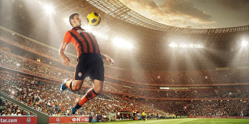 Soccer Player Jumping — Orange, Dramatic