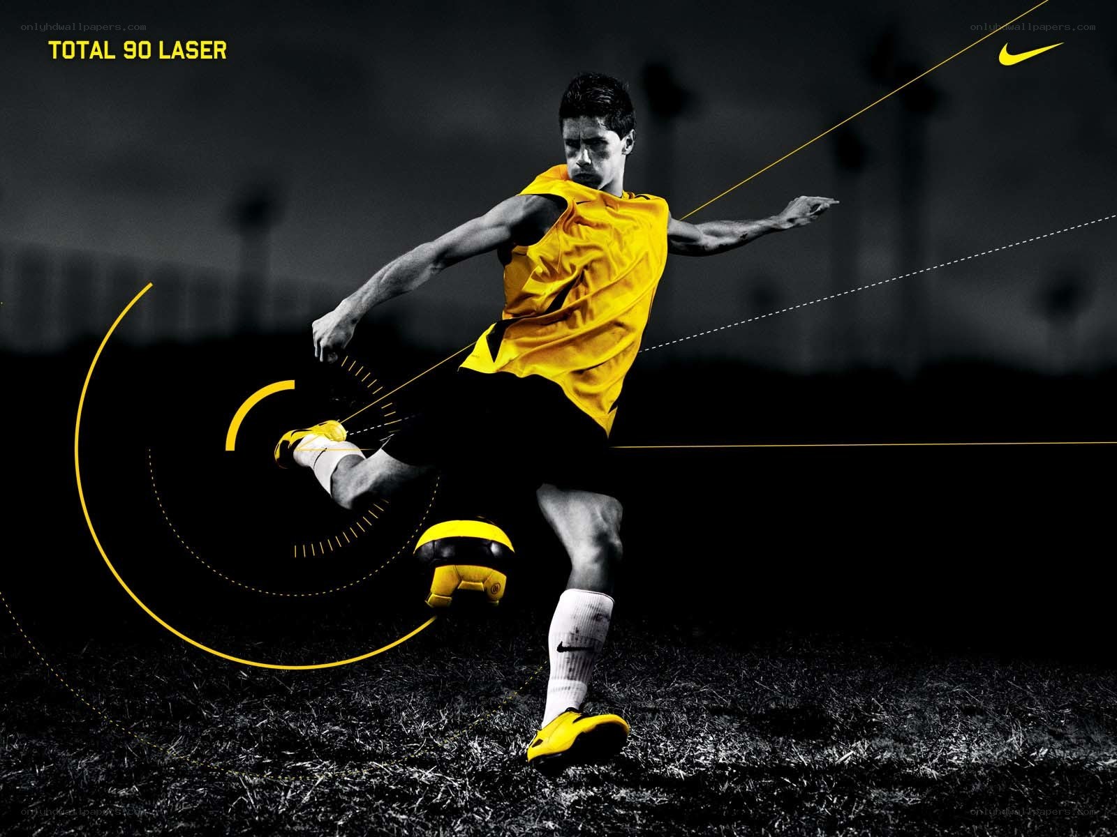 soccer player kicking ball
