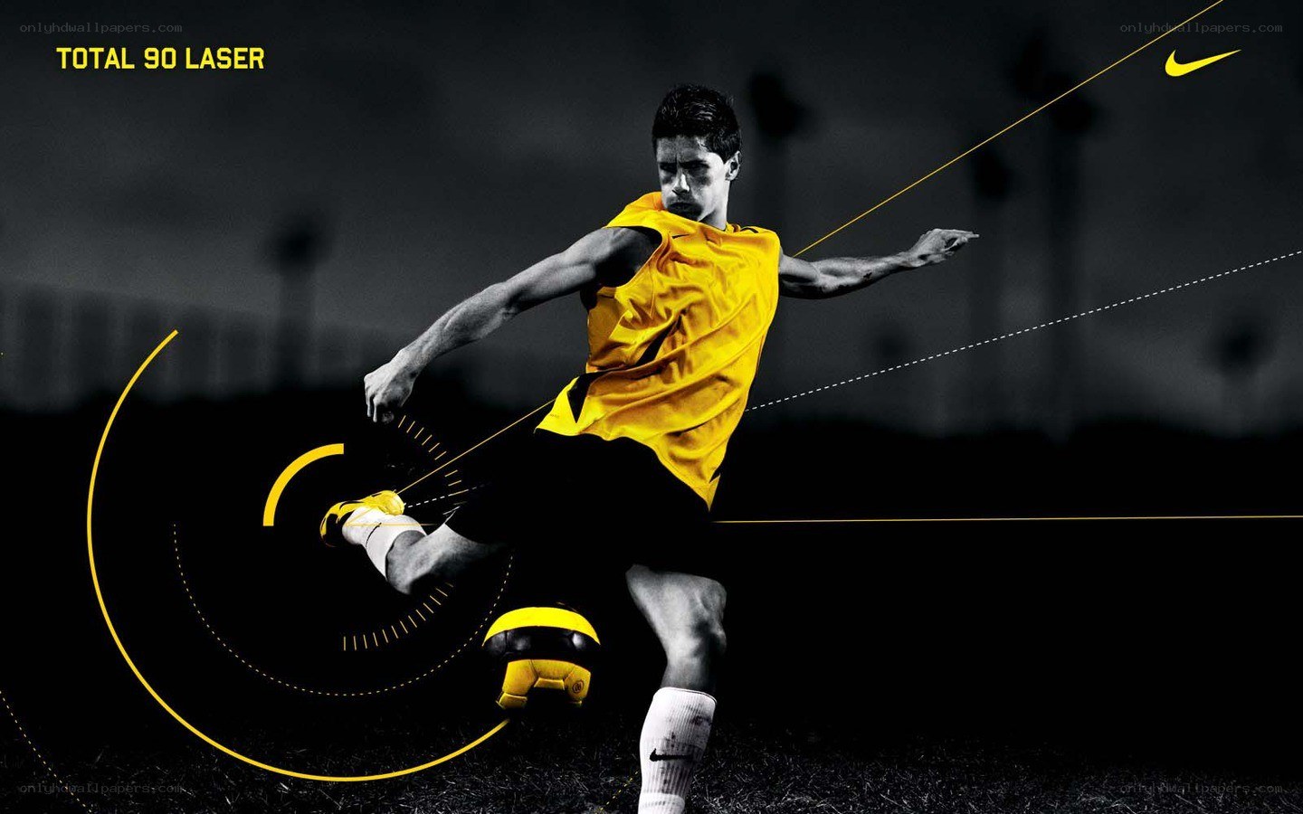 soccer player kicking ball