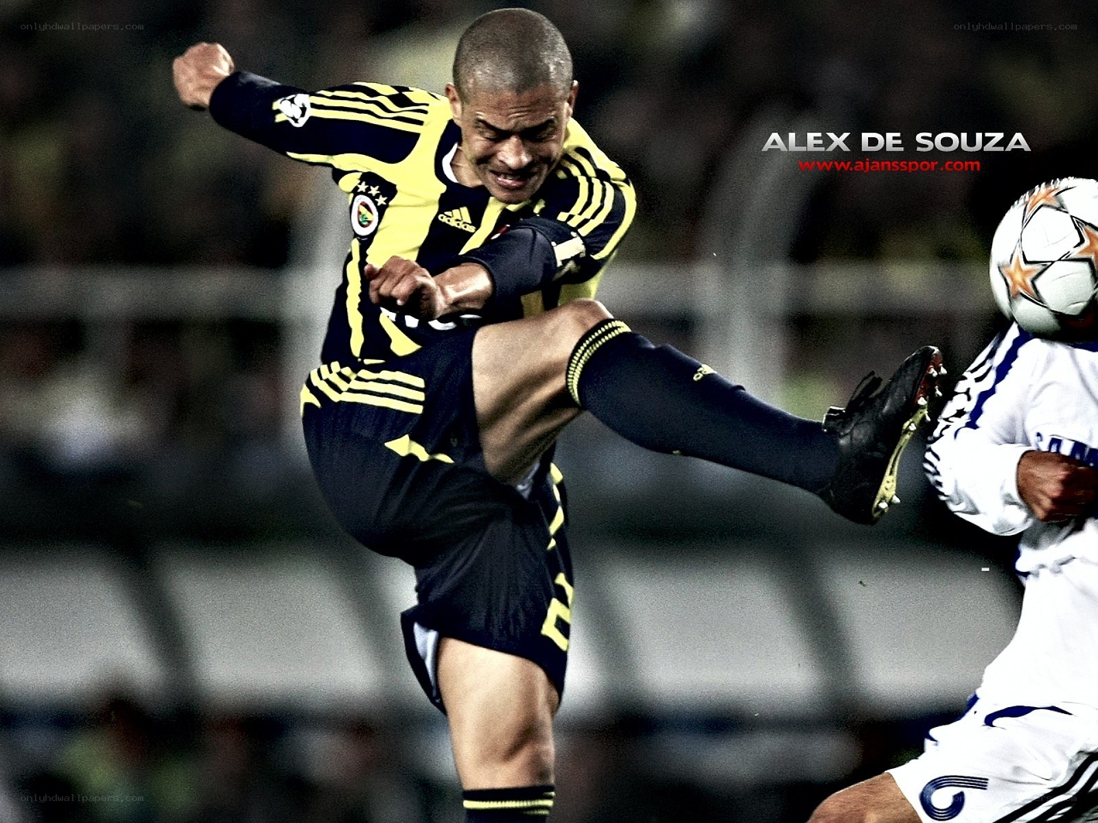 Soccer player kicking ball