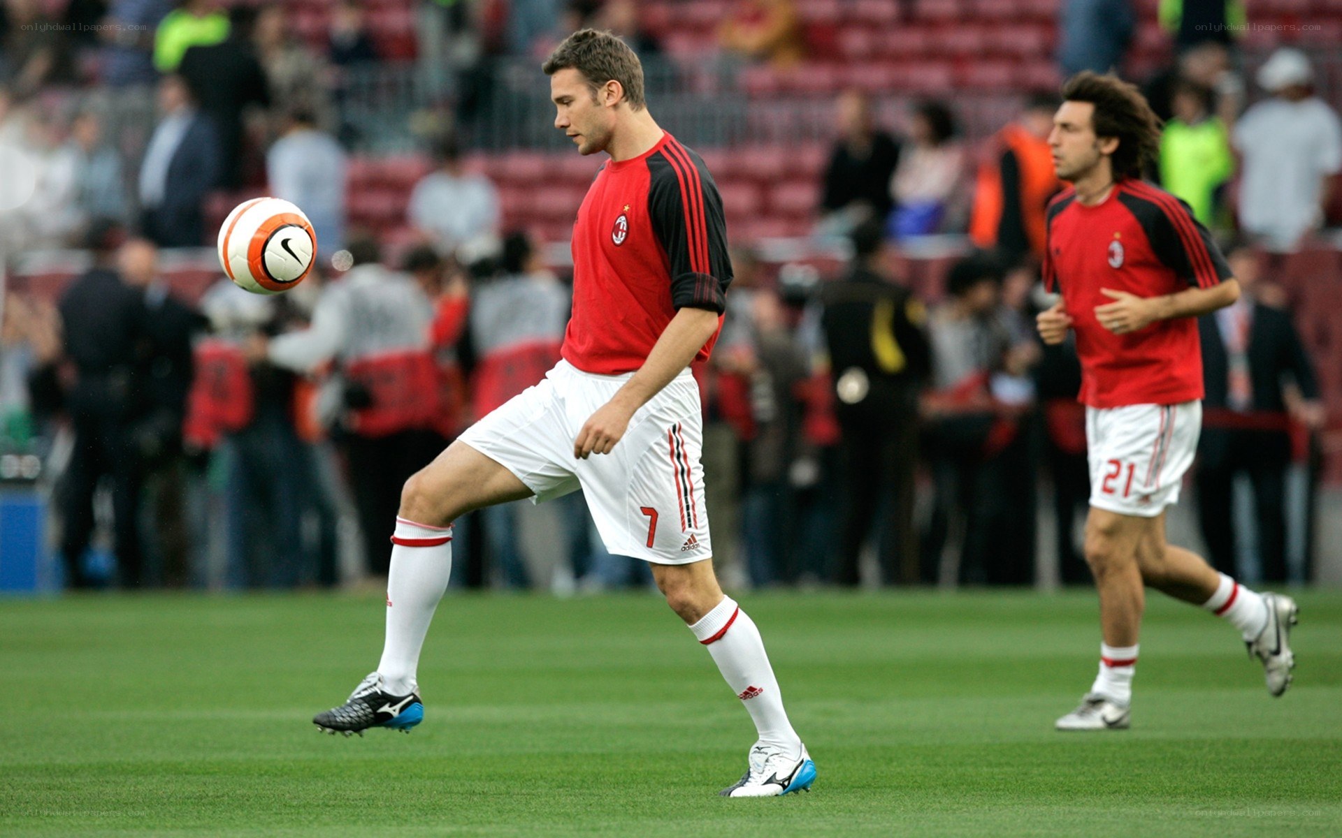 Soccer player kicking ball