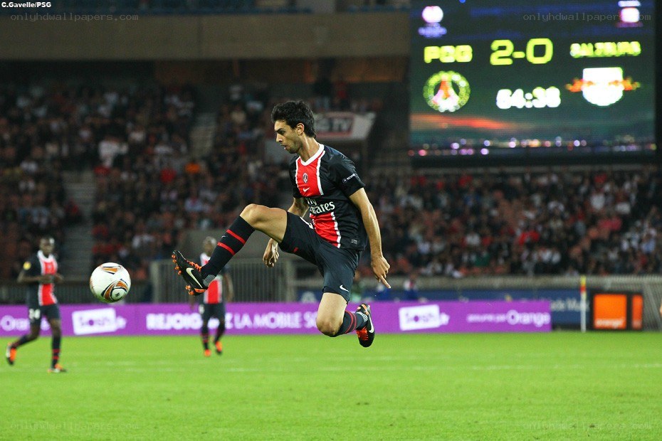 Soccer player kicking ball