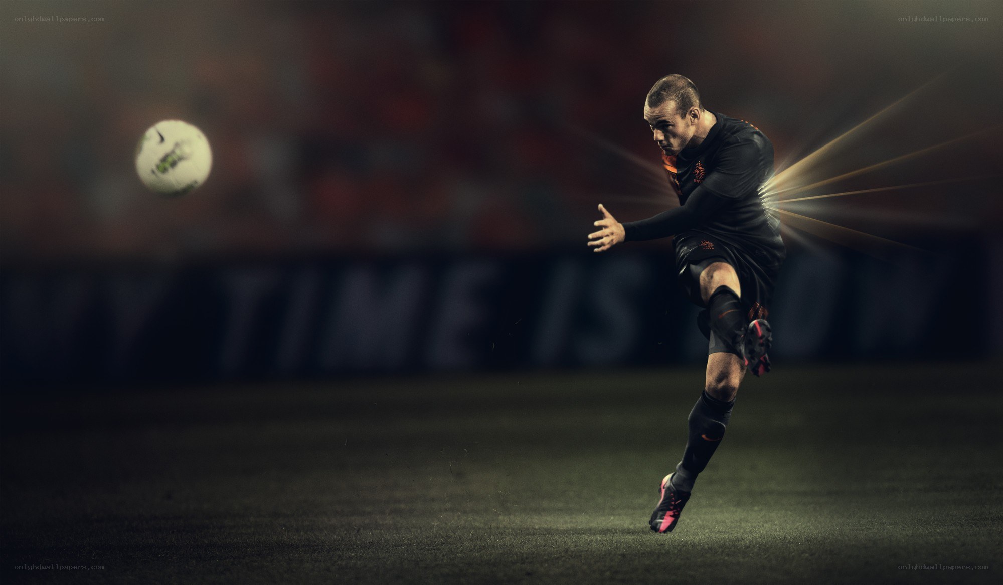 soccer player kicking ball