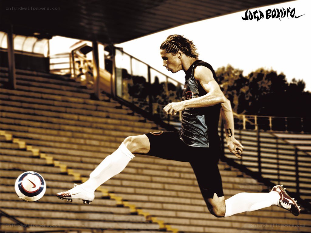Soccer player kicking ball