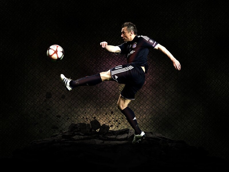Soccer player kicking ball