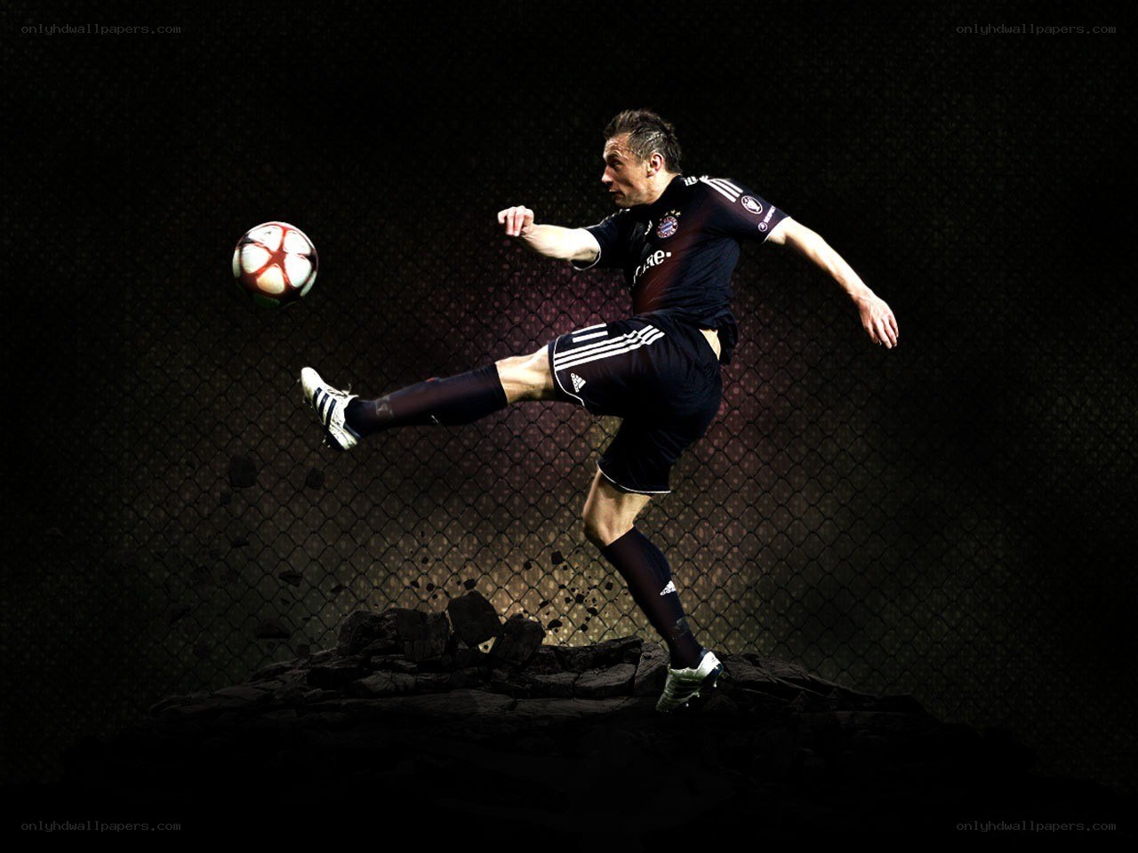 Soccer player kicking ball