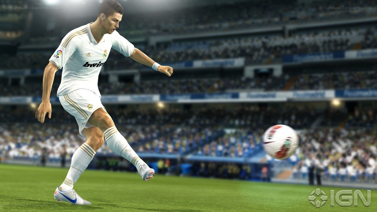soccer player kicking ball