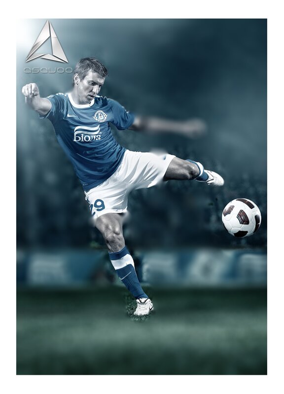 soccer player kicking ball