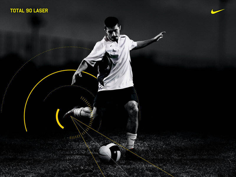 soccer player kicking ball