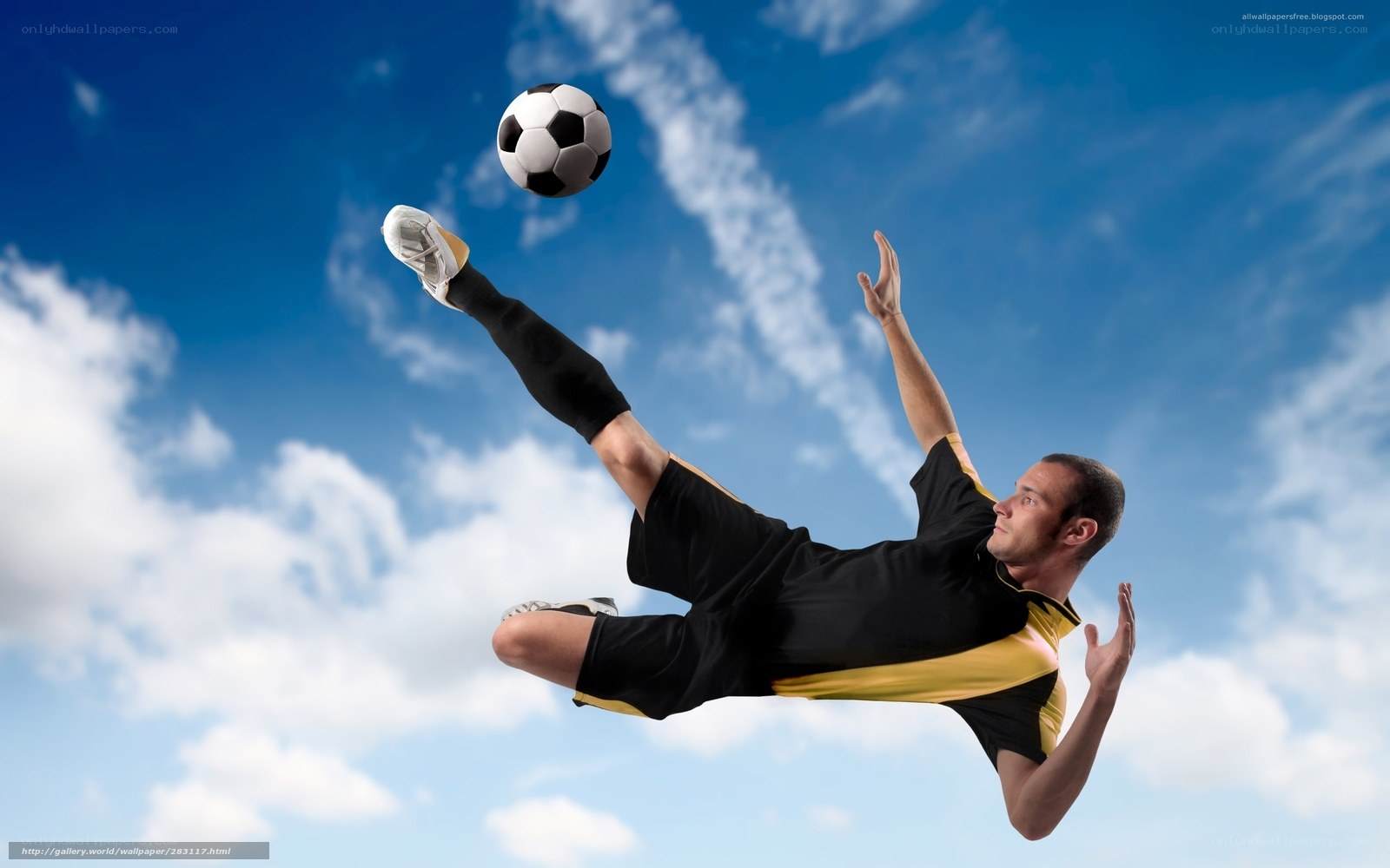 Soccer player kicking ball