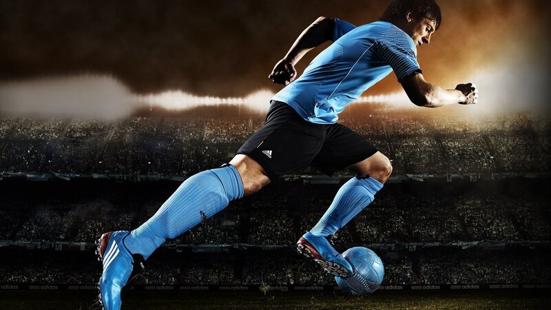 Soccer Player Kicking Ball — Blue, Dramatic, Night, Photograph