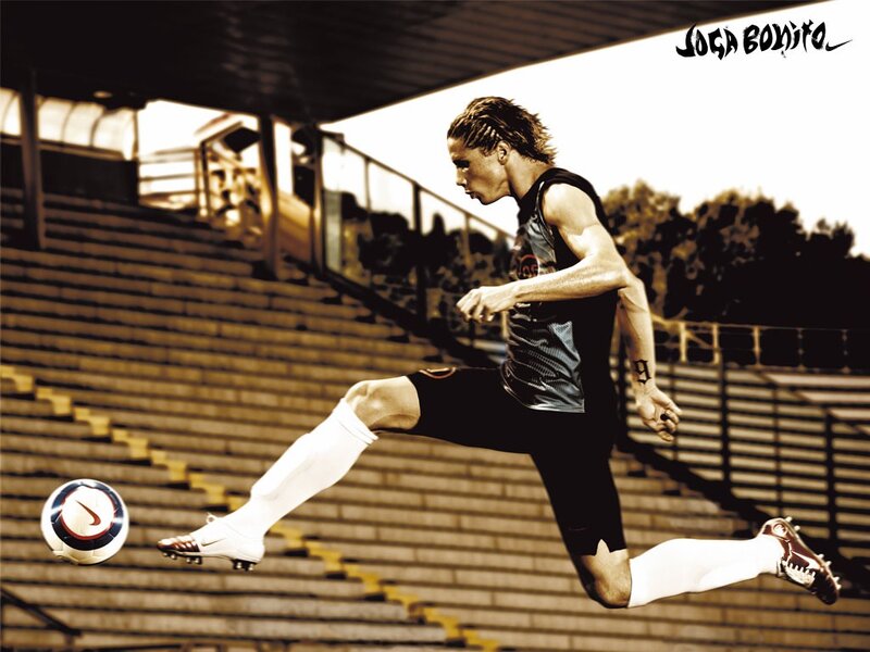Soccer Player Kicking Ball — Brown