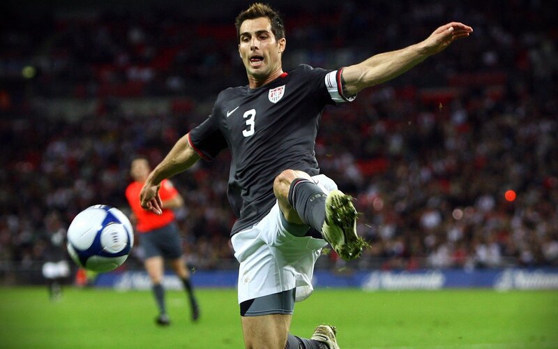 Soccer Player Kicking Ball — Green, Dynamic, Night