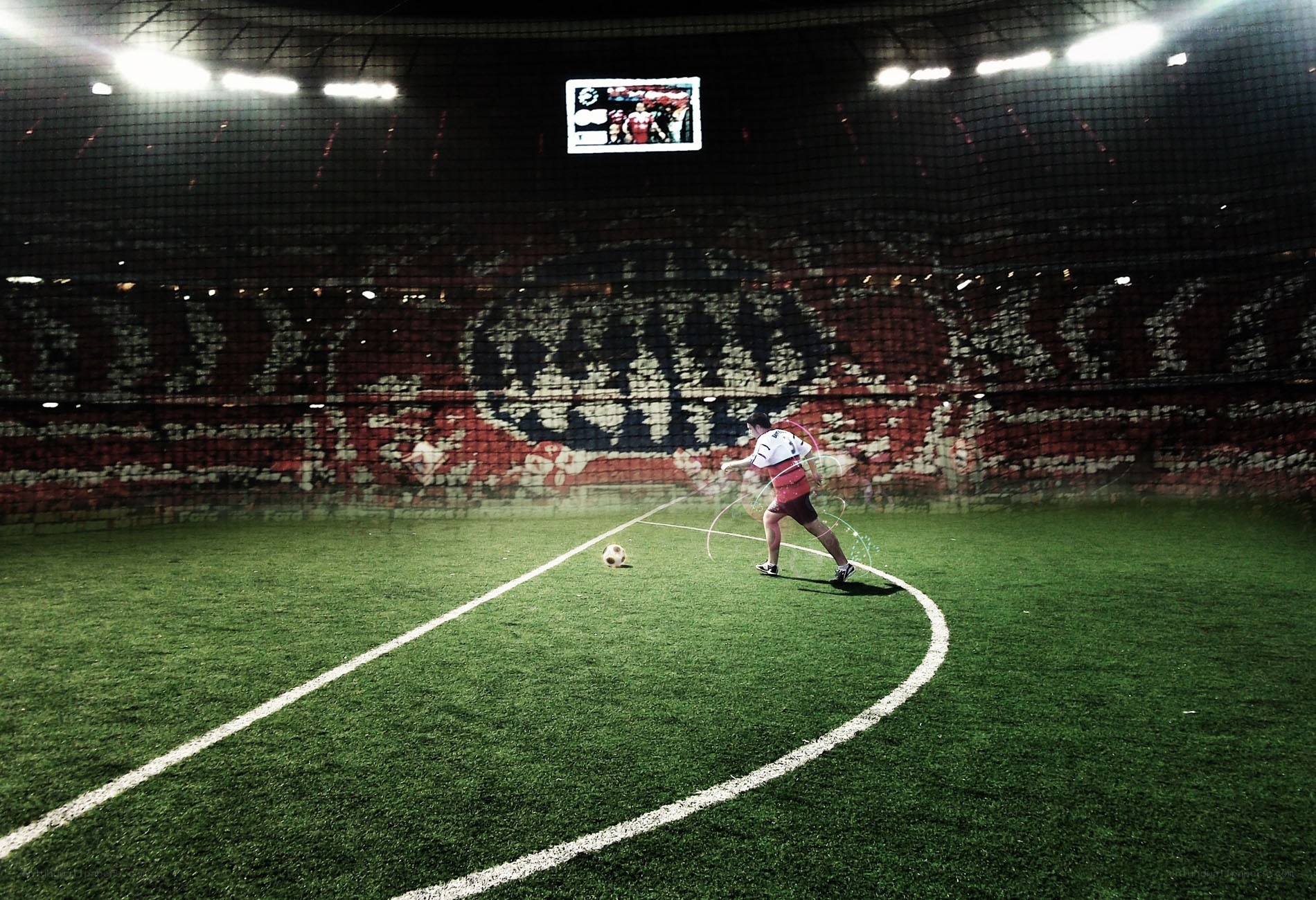 Soccer player on field at night