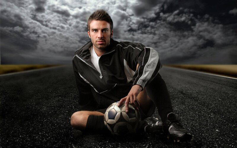 soccer player on road