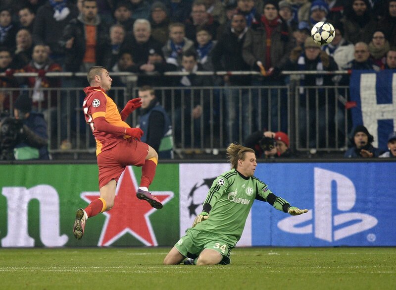 Soccer player scores against goalkeeper