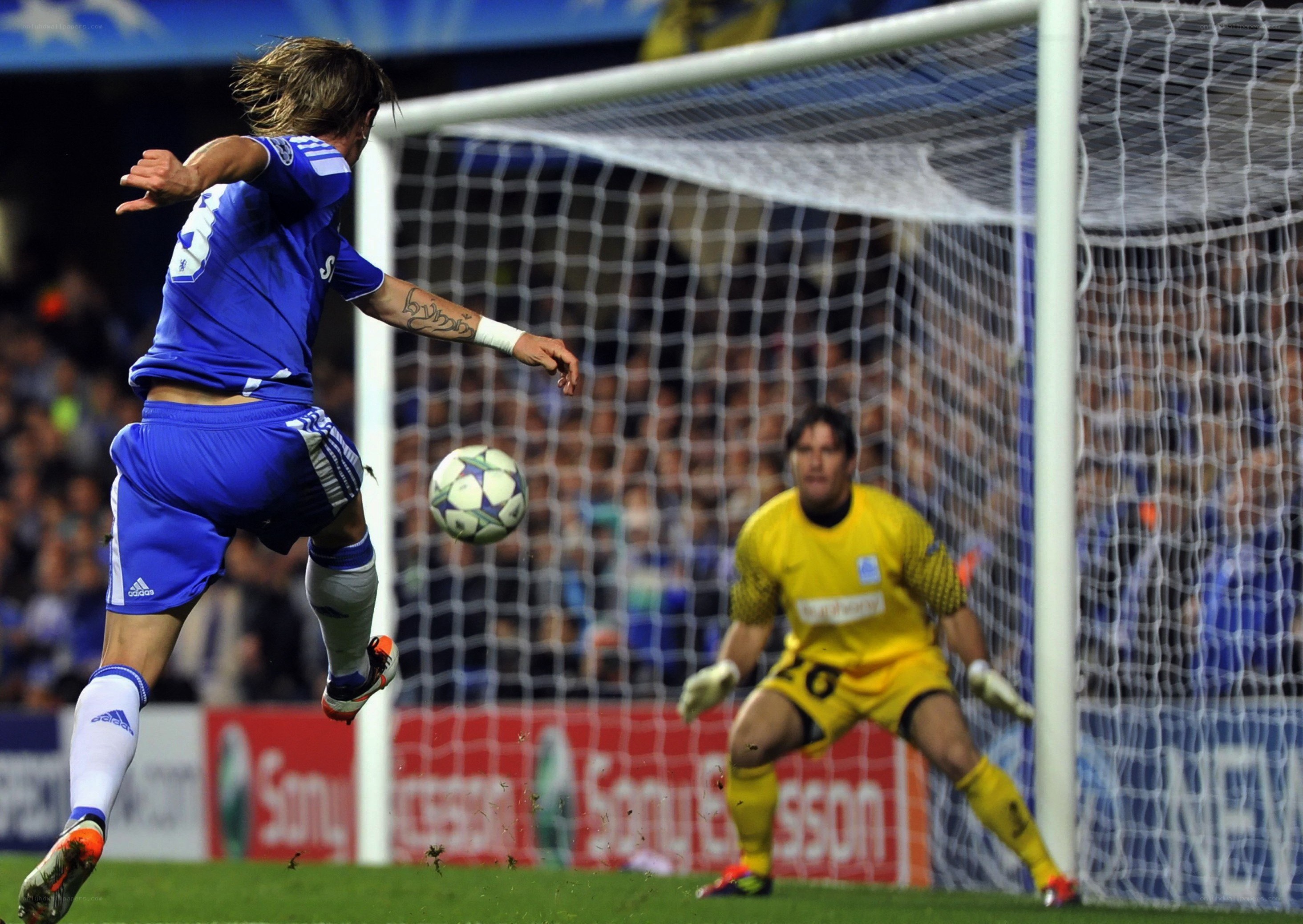 Soccer player scoring a goal
